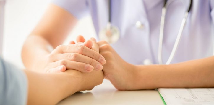 female-psychologist-consulting-patient-desk-hospital-2